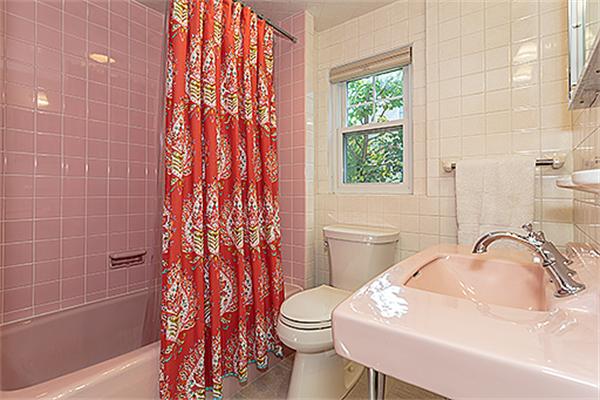 36 Argyle Road Arlington, MA 02476 - Photo 20 of 26 a bathroom with a sink a toilet and shower curtain