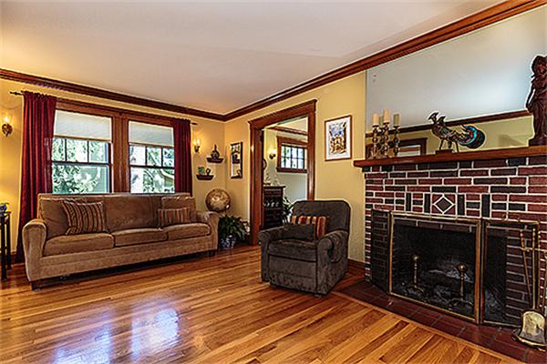 36 Argyle Road Arlington, MA 02476 - Photo 5 of 26 a living room with furniture a flat screen tv and a fireplace