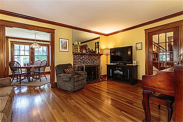 36 Argyle Road Arlington, MA 02476 - Photo 7 of 26 a living room with furniture and a flat screen tv with wooden floor