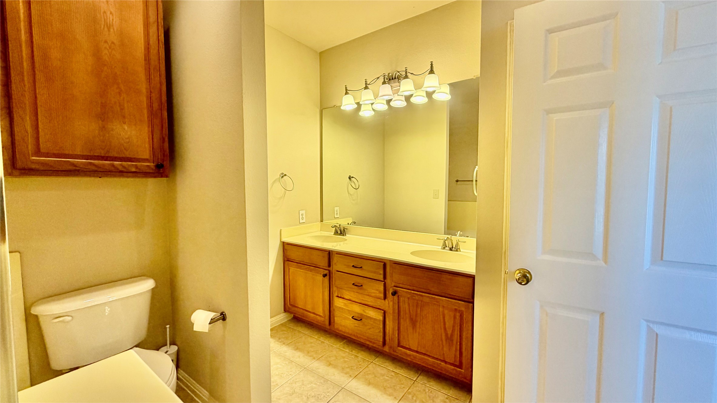 5515 Davis Lane, Unit 82 Austin, TX 78749 - Photo 25 of 28 Primary Bathroom featuring a garden tub, a separate stall shower, vanity, and light tile patterned floors.