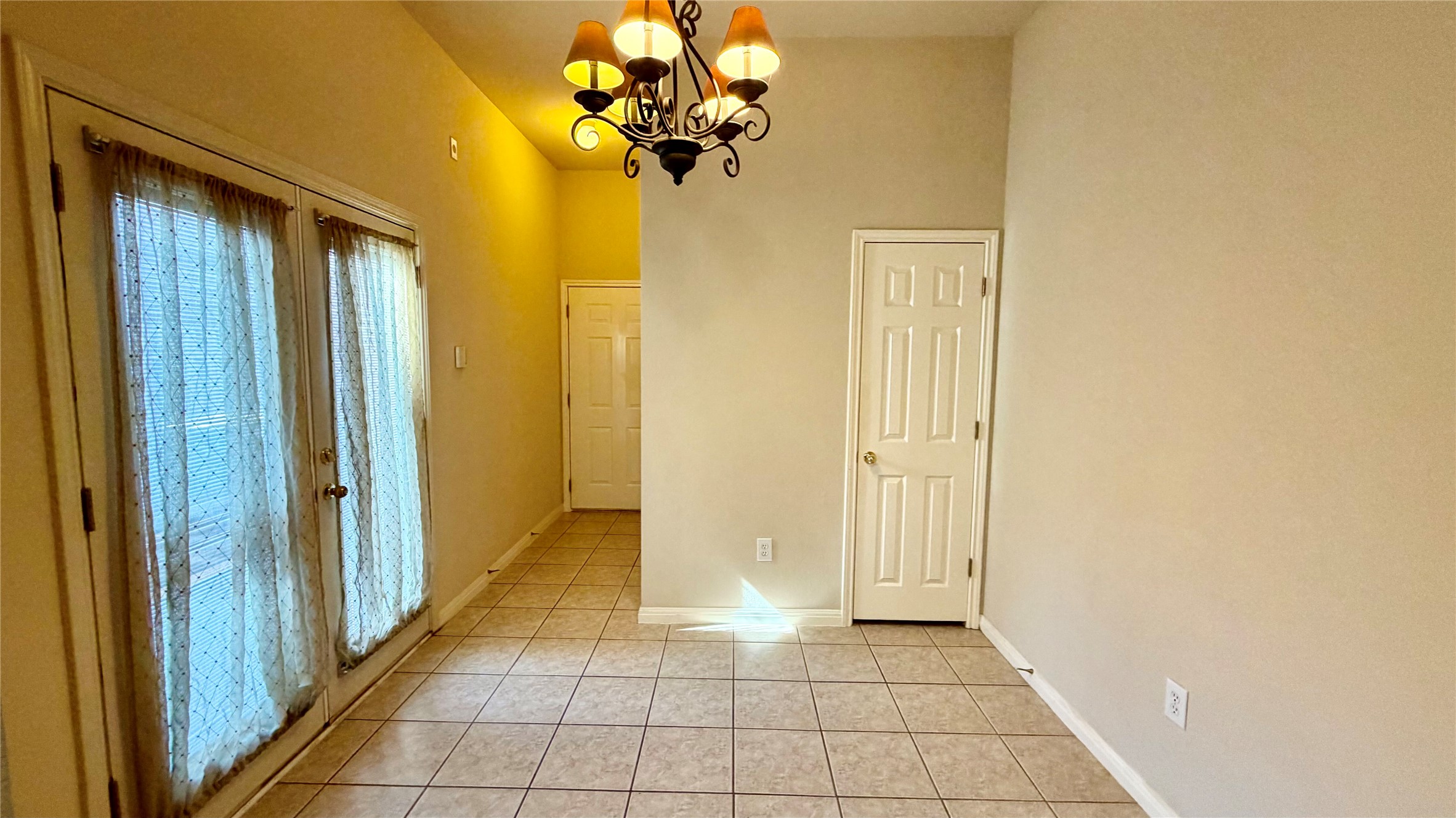 5515 Davis Lane, Unit 82 Austin, TX 78749 - Photo 10 of 28 Breakfast area with French doorway to private patio, access to garage and laundry area.
