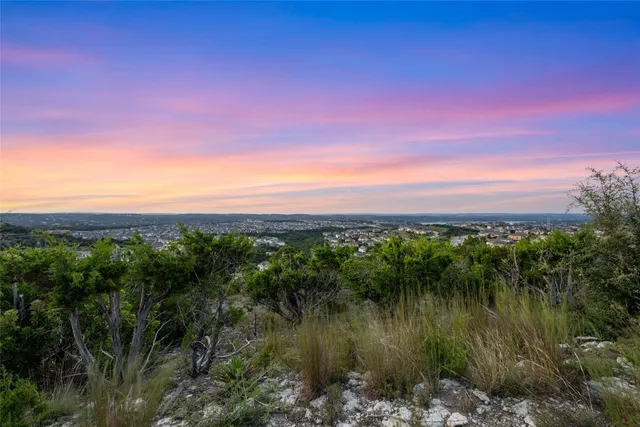 a view of a lake and a yard