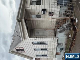 a front view of a house with a garage