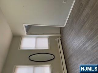 1131 Main Street Paterson, NJ 07503 - Photo 2 of 10 a view of a room with wooden floor and a window