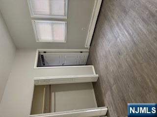1131 Main Street Paterson, NJ 07503 - Photo 7 of 10 an empty room with windows