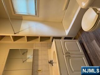 1131 Main Street Paterson, NJ 07503 - Photo 10 of 10 a bathroom with a sink a toilet and bathtub