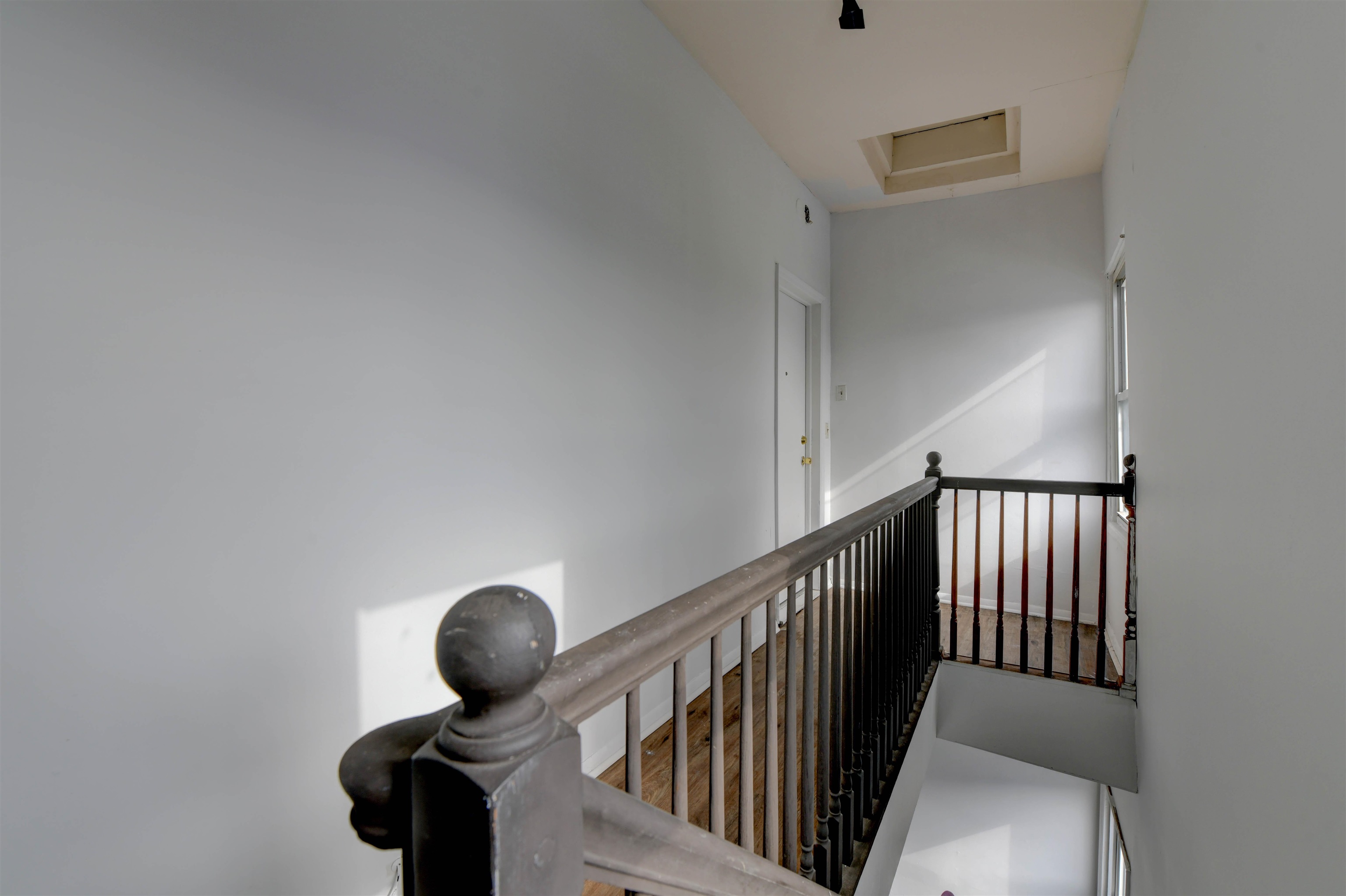625 Harrison Avenue, Unit 2 Harrison, NJ 07029 - Photo 23 of 25 a view of staircase with white walls