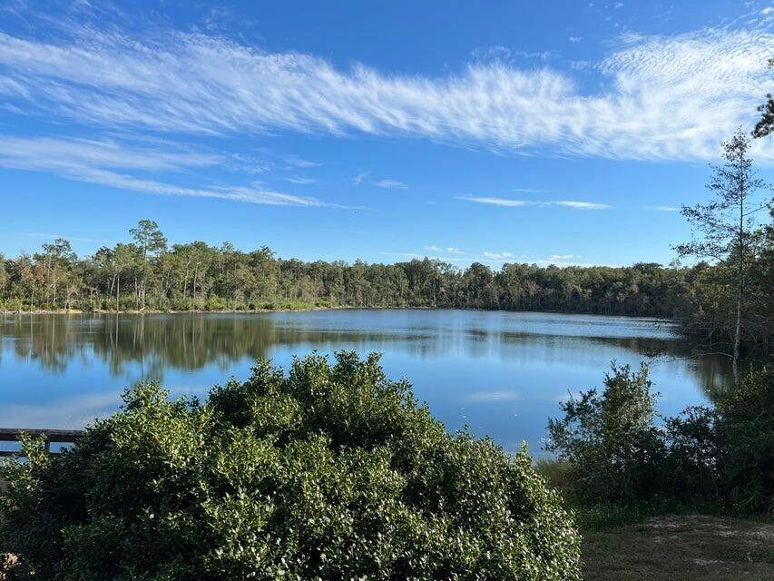 Lot 16 Sable Court Chipley, FL 32428 - Photo 5 of 12 a view of a lake from a yard