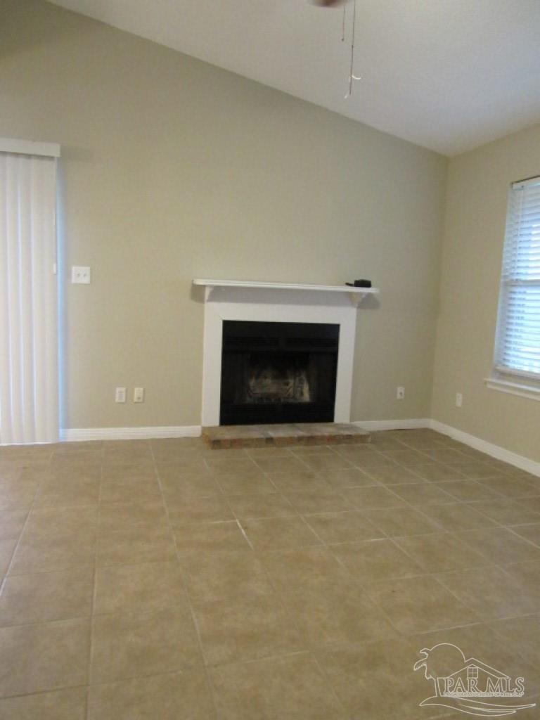 3322 Pine Forest Road Cantonment, FL 32533 - Photo 3 of 9 a view of empty room with a fireplace