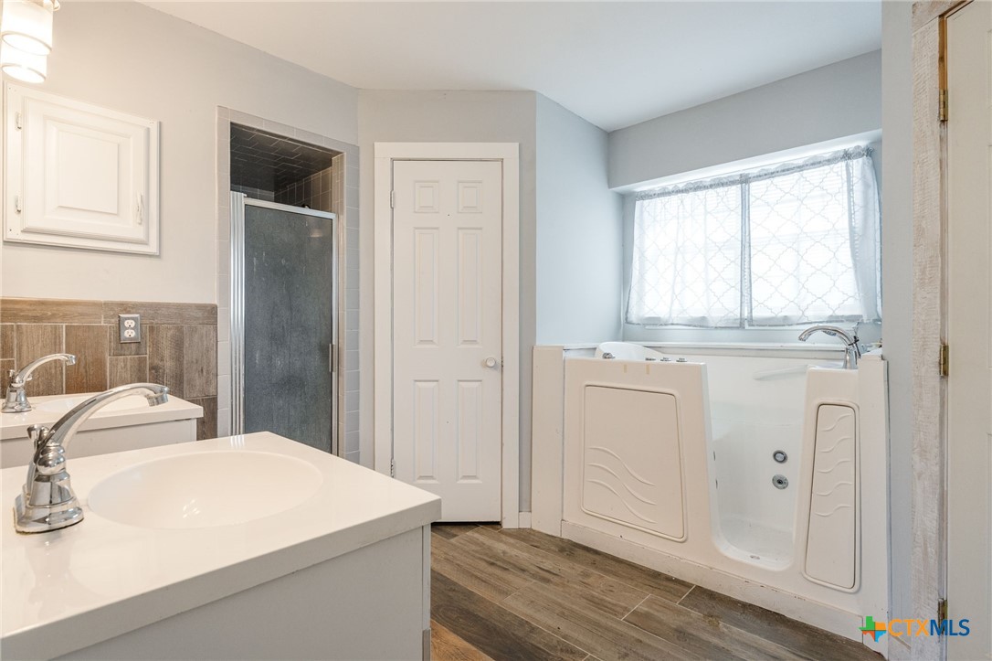 554 County Road 4707 Kempner, TX 76539 - Photo 15 of 33 a room with a sink and a mirror