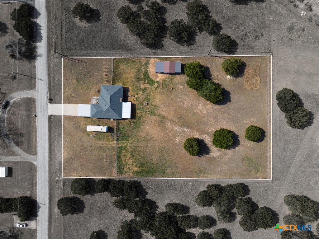 554 County Road 4707 Kempner, TX 76539 - Photo 32 of 33 an aerial view of a house with a backyard