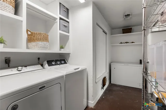 a utility room with dryer and washer