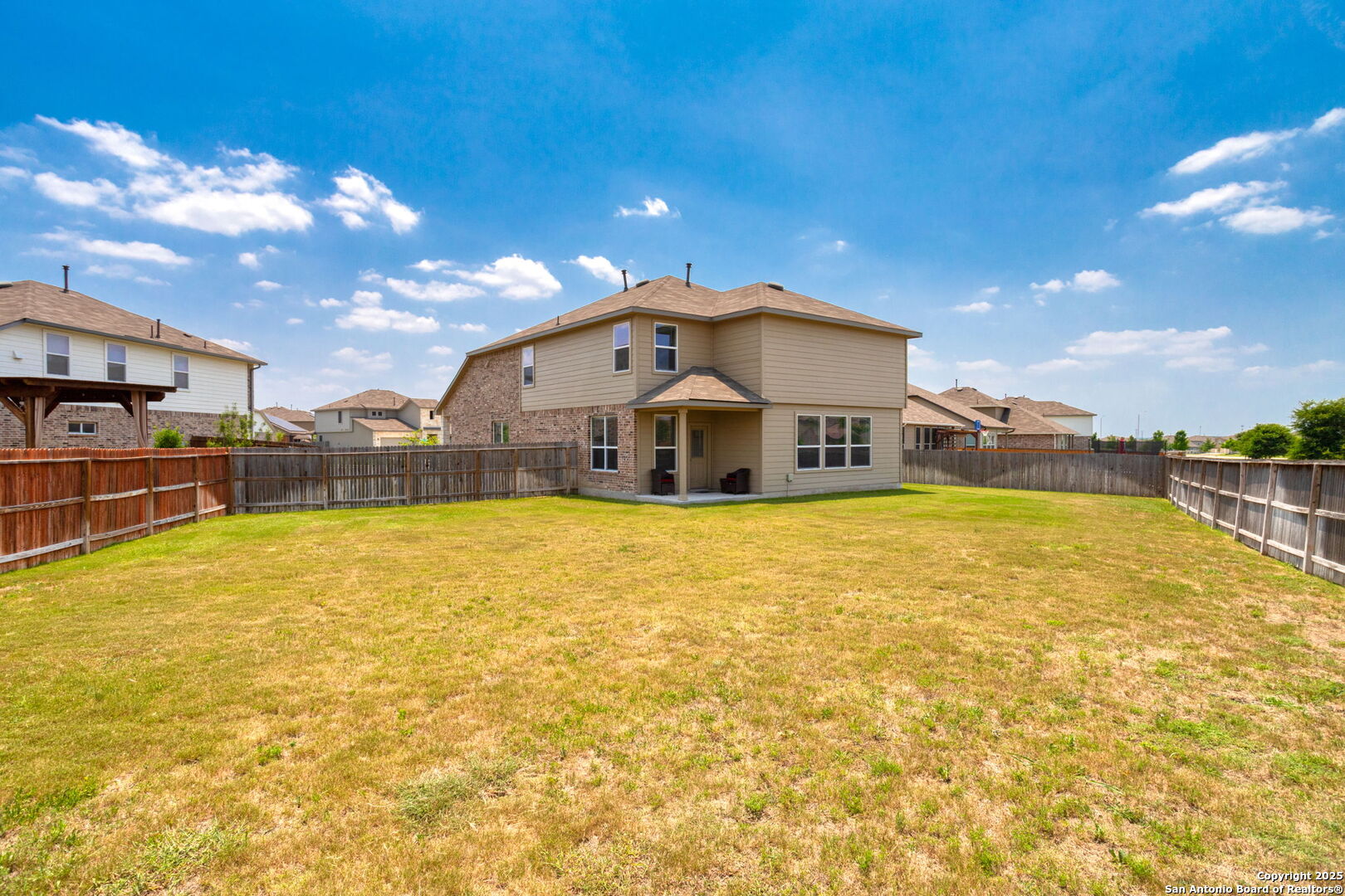 104 Mossy Bank Cibolo, TX 78108 - Photo 28 of 30 a front view of a house with swimming pool
