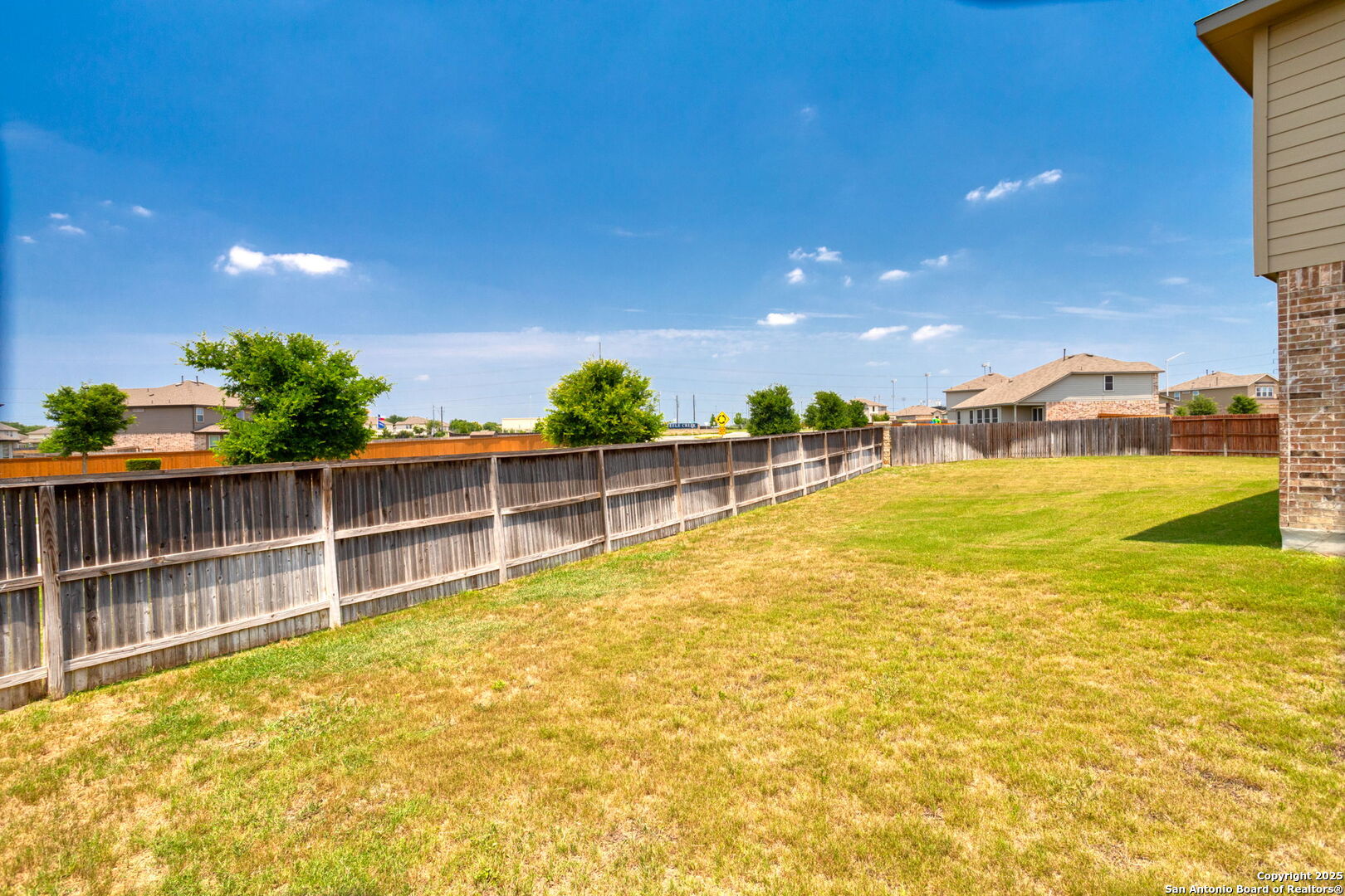 104 Mossy Bank Cibolo, TX 78108 - Photo 29 of 30 a view of a swimming pool with an outdoor space and seating area