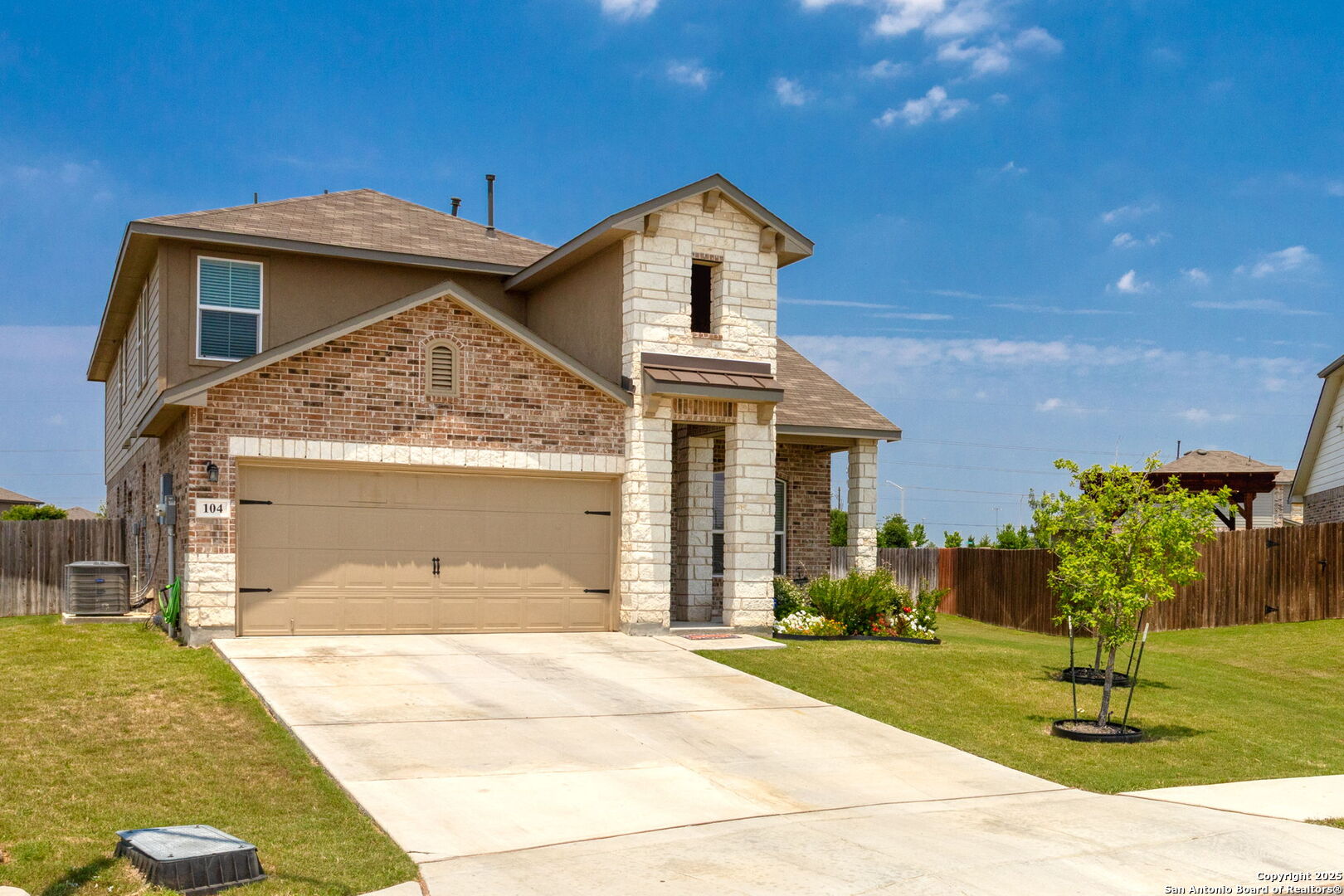 104 Mossy Bank Cibolo, TX 78108 - Photo 30 of 30 a front view of a house with a yard