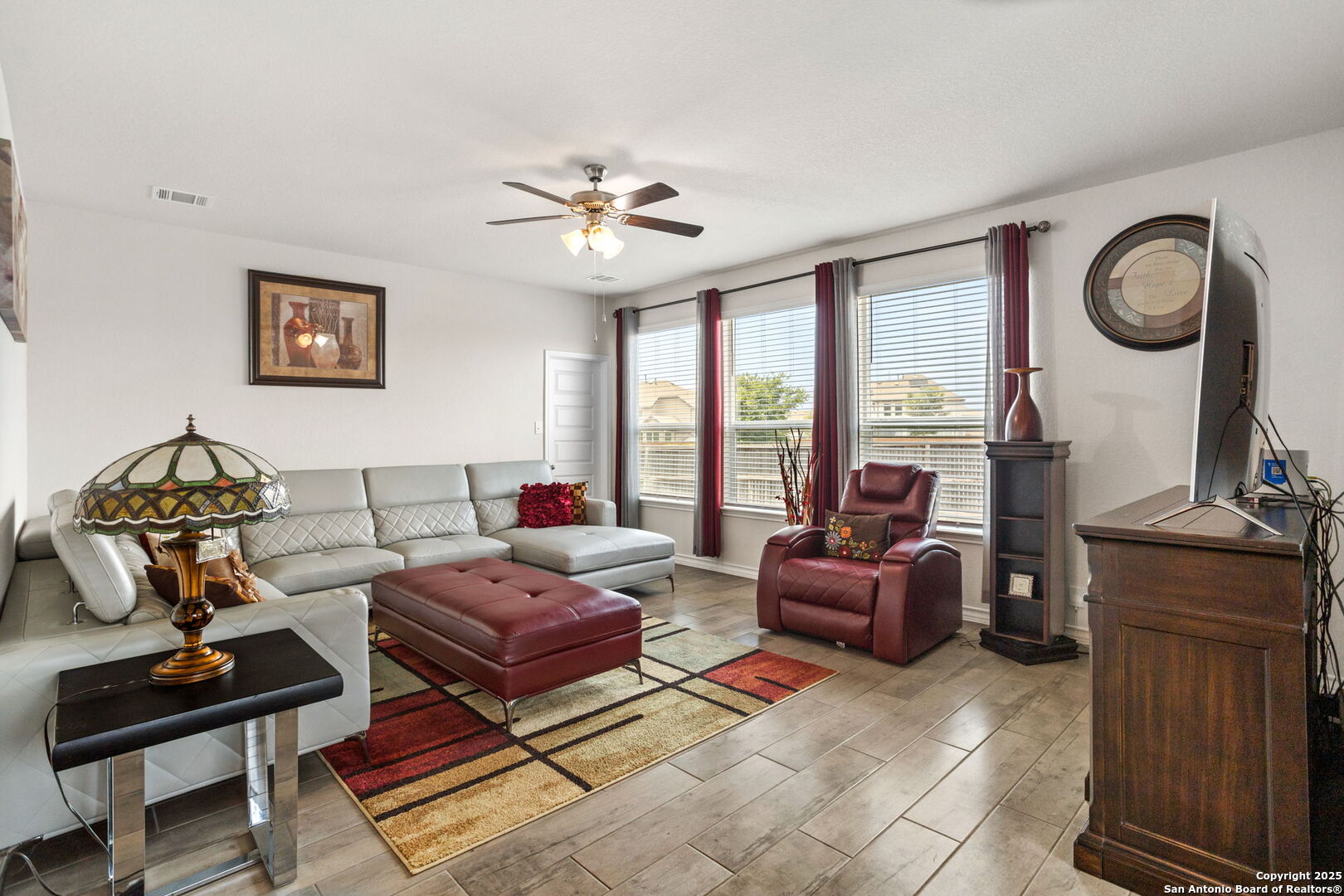104 Mossy Bank Cibolo, TX 78108 - Photo 4 of 30 a living room with furniture a rug and a window