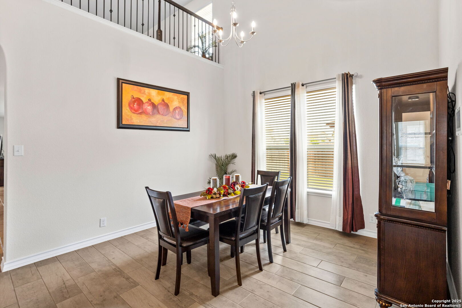 104 Mossy Bank Cibolo, TX 78108 - Photo 9 of 30 a view of a dining room with furniture window and wooden floor