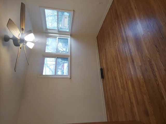 a view of entryway with wooden floor