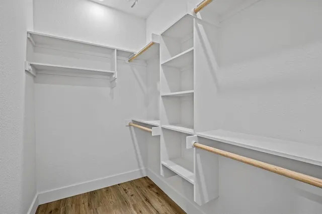 a view of an empty walk in closet