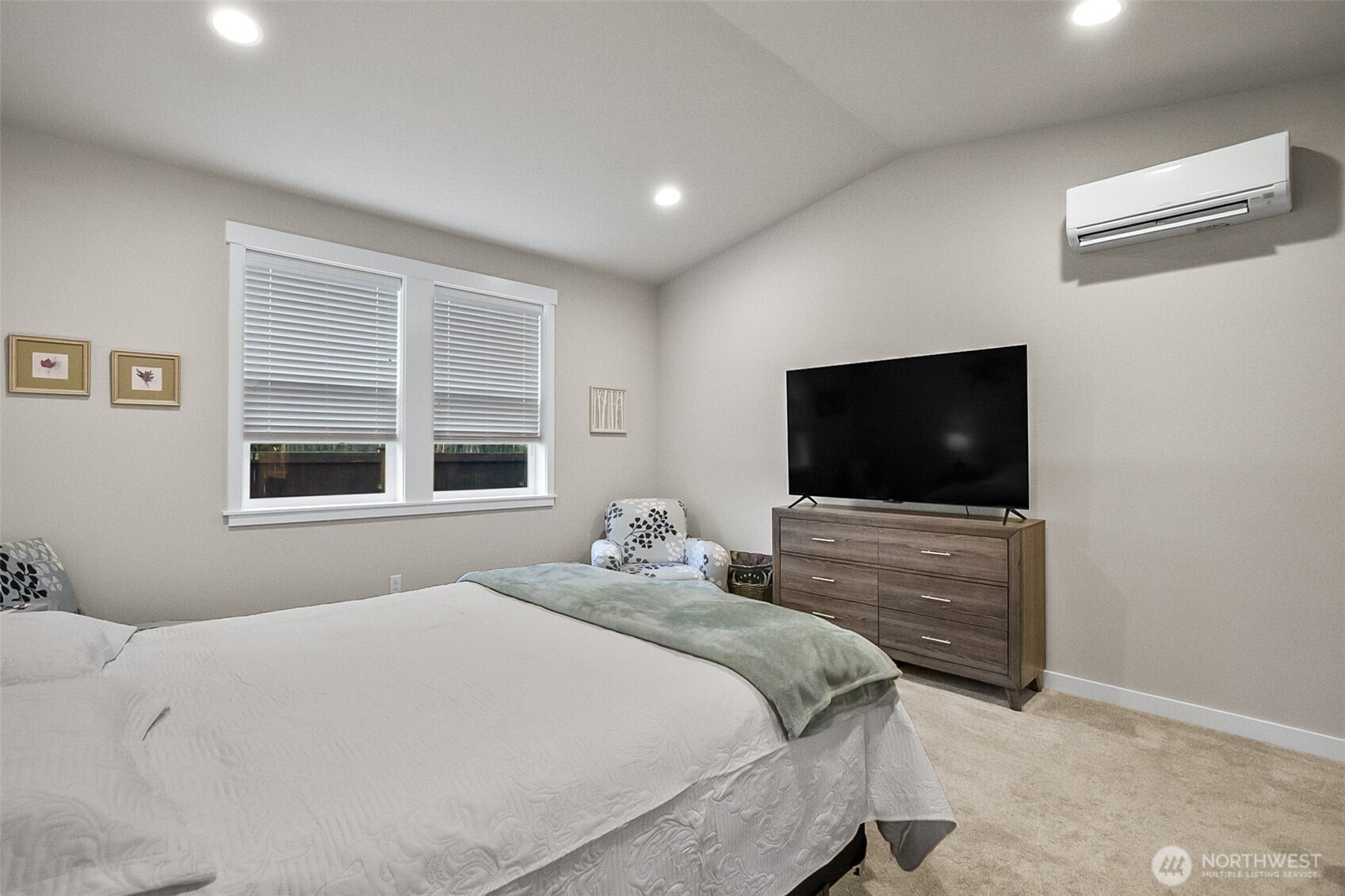 772 Parkland Loop Sedro-Woolley, WA 98284 - Photo 14 of 40 a bedroom with a bed and a flat screen tv