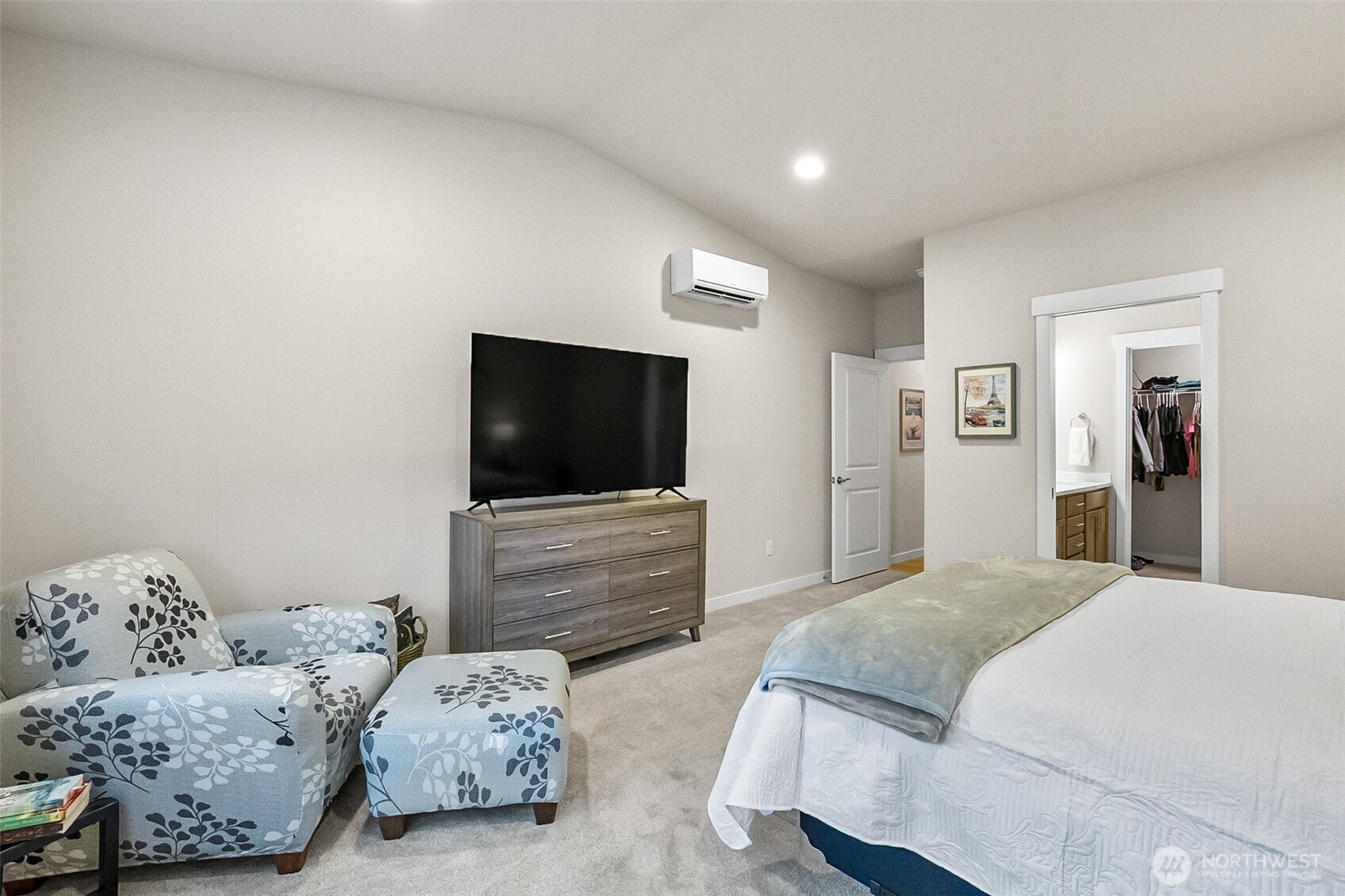 772 Parkland Loop Sedro-Woolley, WA 98284 - Photo 15 of 40 a bedroom with a bed and a flat screen tv