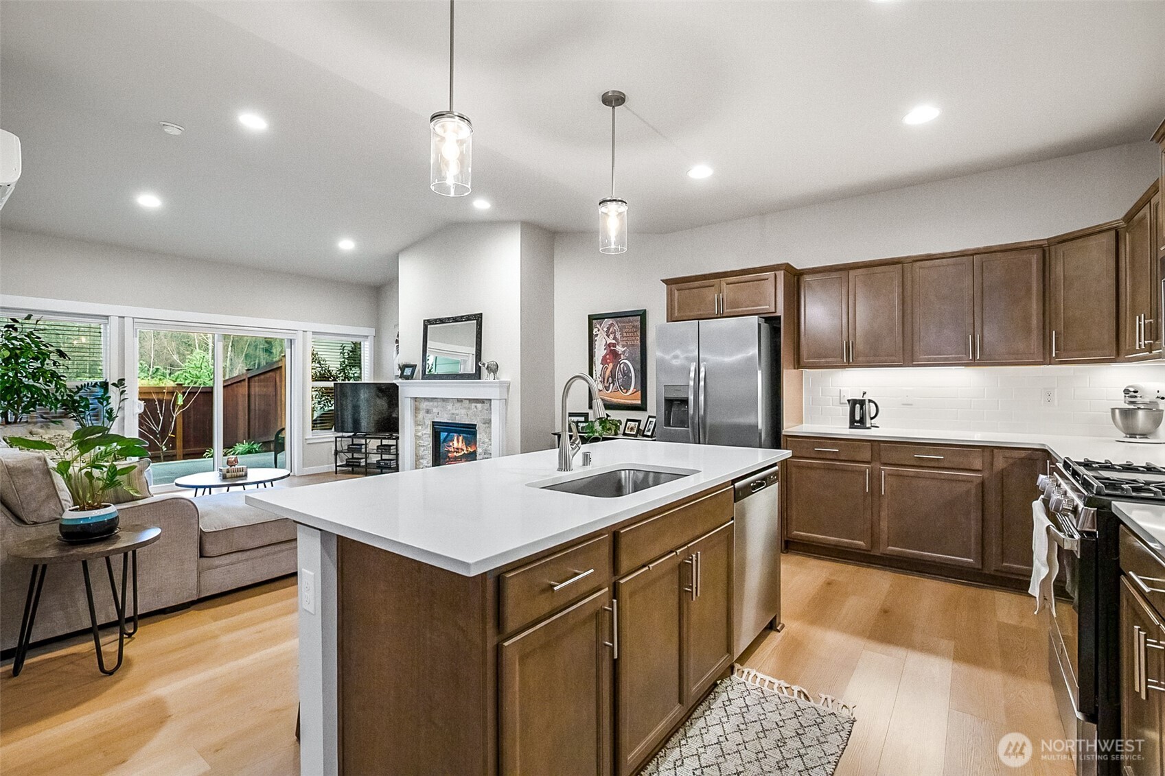772 Parkland Loop Sedro-Woolley, WA 98284 - Photo 20 of 40 a kitchen with a sink stove and refrigerator