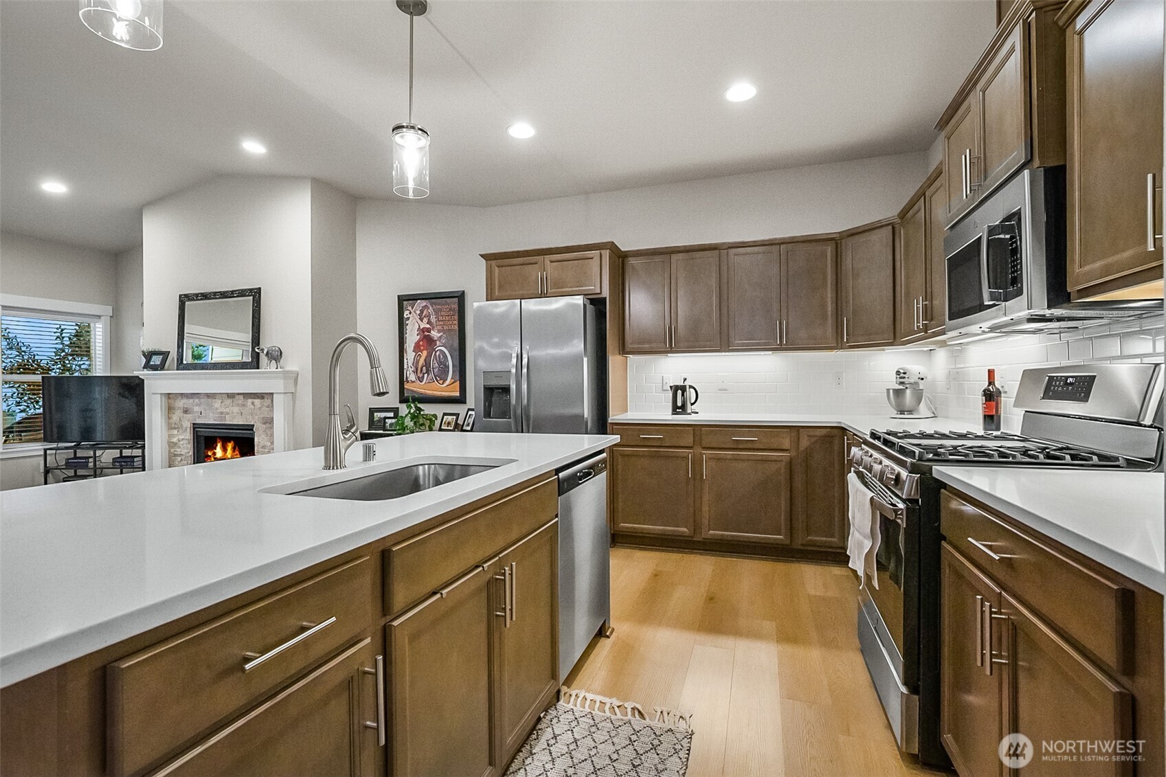 772 Parkland Loop Sedro-Woolley, WA 98284 - Photo 21 of 40 a kitchen with a sink stove and refrigerator