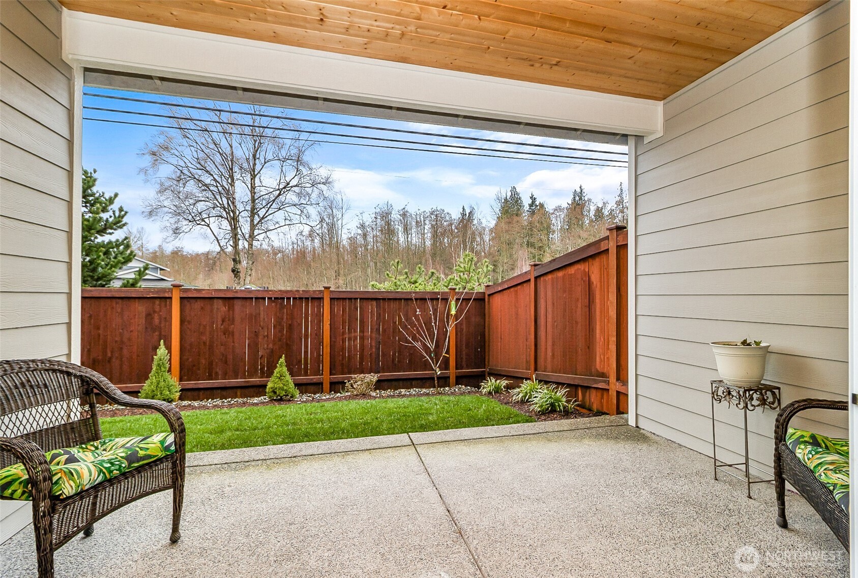 772 Parkland Loop Sedro-Woolley, WA 98284 - Photo 28 of 40 a view of a backyard with chair and iron fence