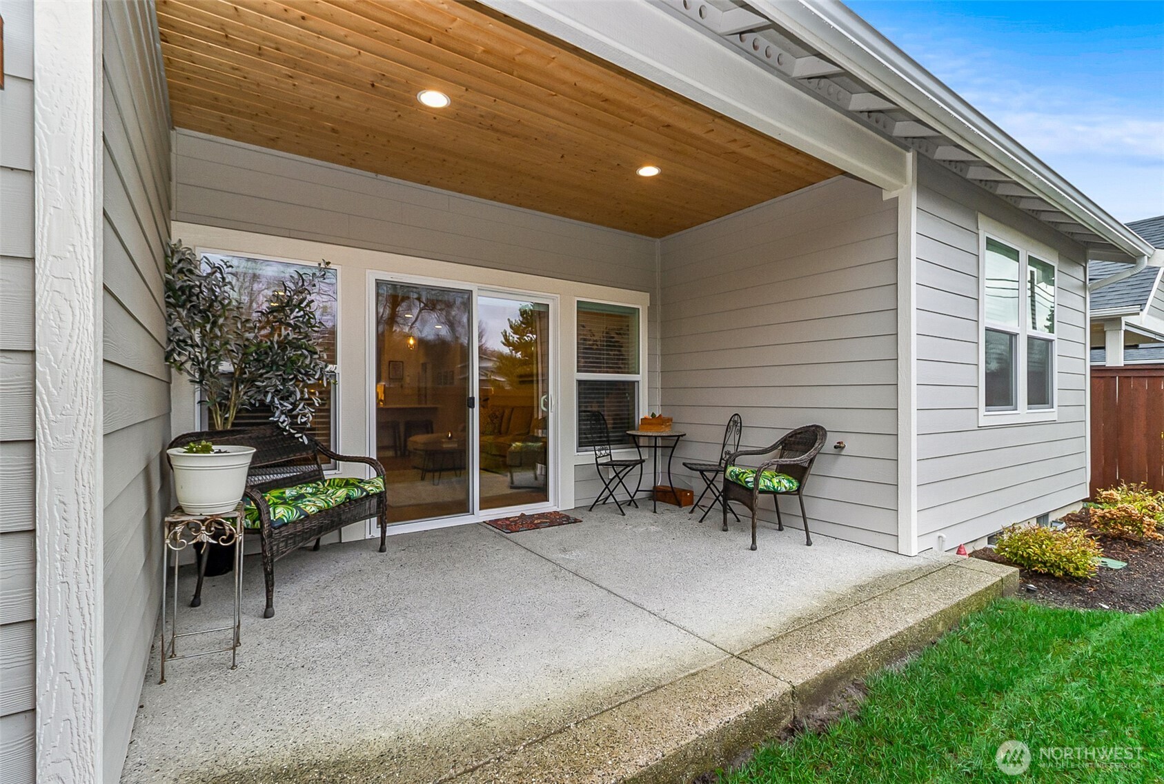 772 Parkland Loop Sedro-Woolley, WA 98284 - Photo 29 of 40 a view of a patio with table and chairs and potted plants