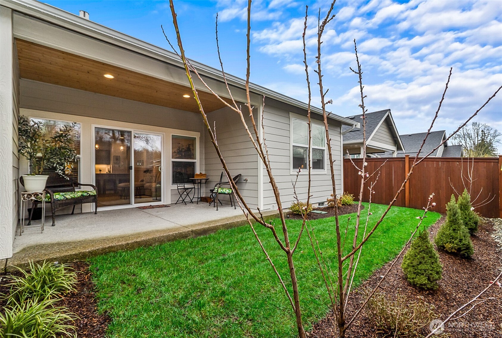 772 Parkland Loop Sedro-Woolley, WA 98284 - Photo 30 of 40 a view of a house with backyard and sitting area