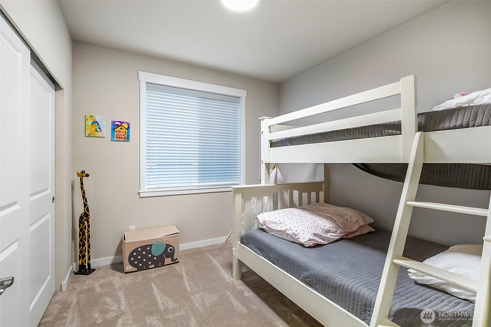 772 Parkland Loop Sedro-Woolley, WA 98284 - Photo 8 of 40 a bedroom with a bed and a window