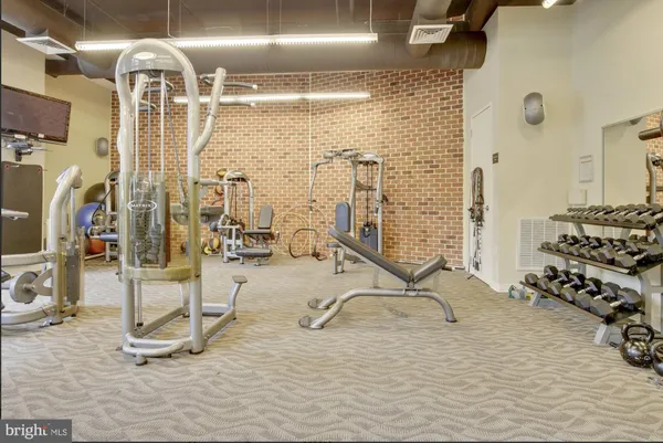 a view of a room with gym equipment