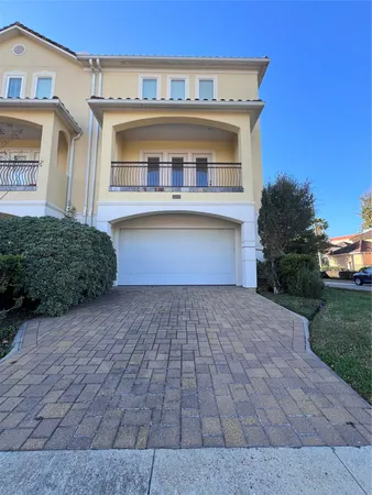 a view of a building with a yard