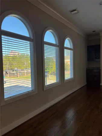 a view of front door and wooden floor