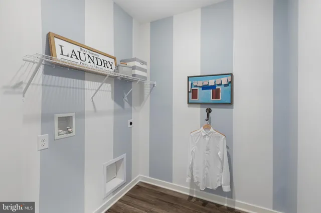 a bedroom with a bed a mirror and a large window