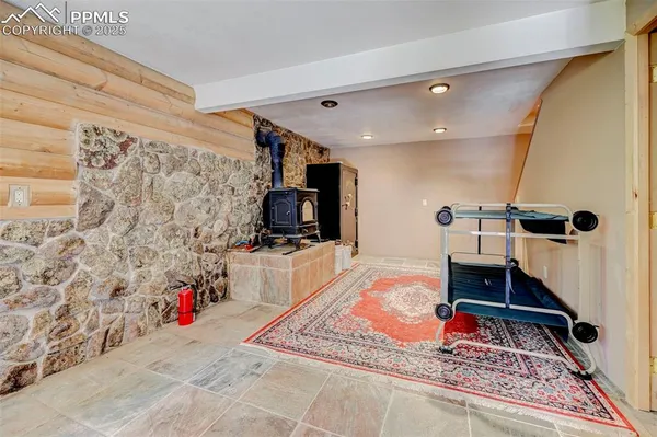 a room with gym equipment and a mirror