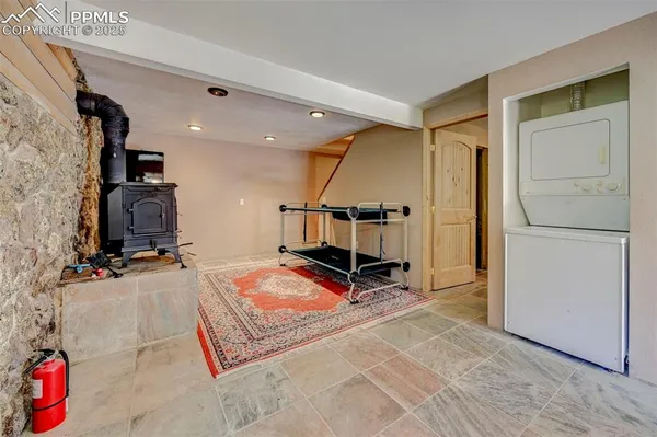 a bedroom with a bed and a table