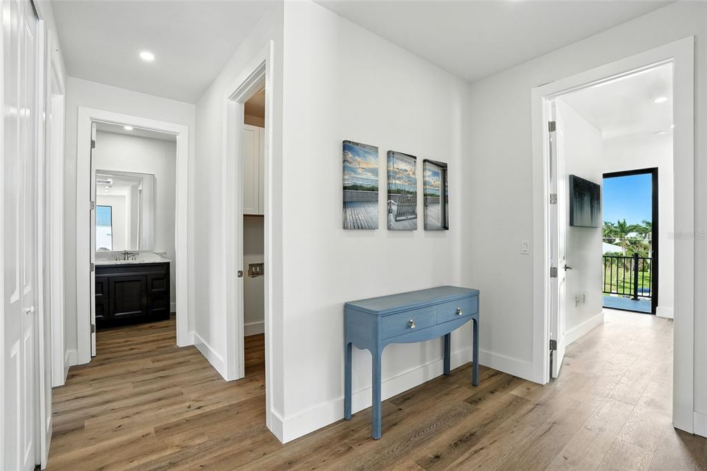 207 Shreve Street Punta Gorda, FL 33950 - Photo 13 of 45 a view of a hallway with wooden floor and closet