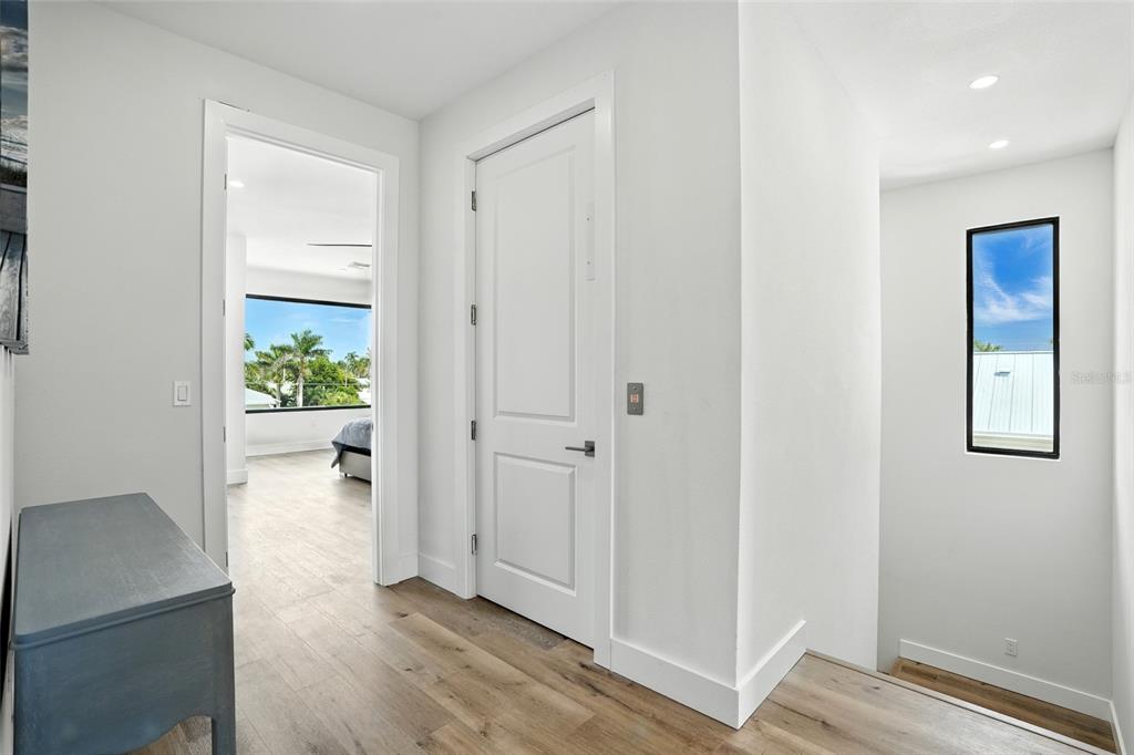 207 Shreve Street Punta Gorda, FL 33950 - Photo 22 of 45 a view of entryway with wooden floor