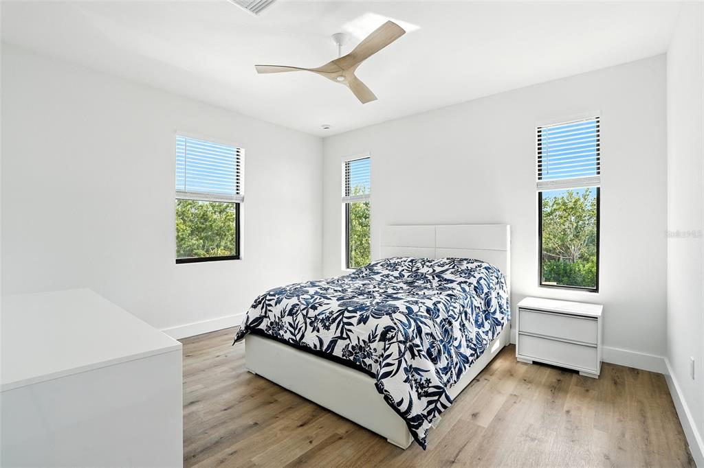 207 Shreve Street Punta Gorda, FL 33950 - Photo 26 of 45 a bedroom with a bed and a window