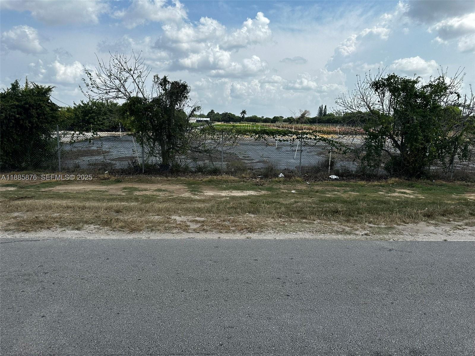 19815 Southwest 256th Street Homestead, FL 33031 - Photo 29 of 39 a view of a lake view