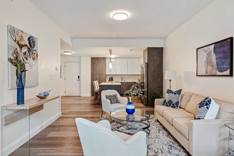 a living room with furniture and a couch