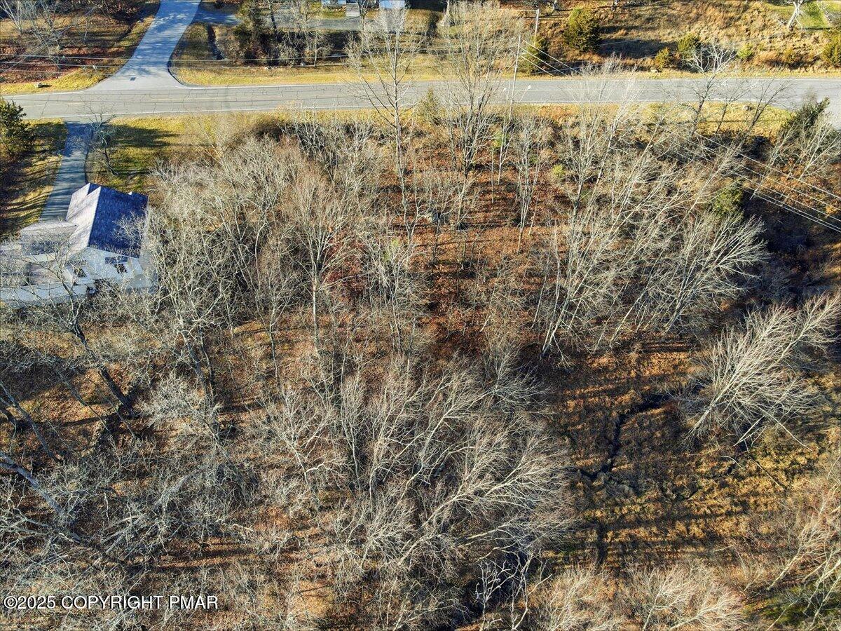 3 Kirkham Road Bushkill, PA 18324 - Photo 8 of 15 a view of a houses with a yard