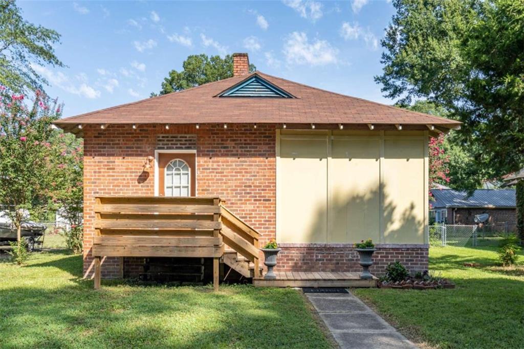 4 Hickory Street Northeast Rome, GA 30161 - Photo 1 of 1 a front view of a house with a yard
