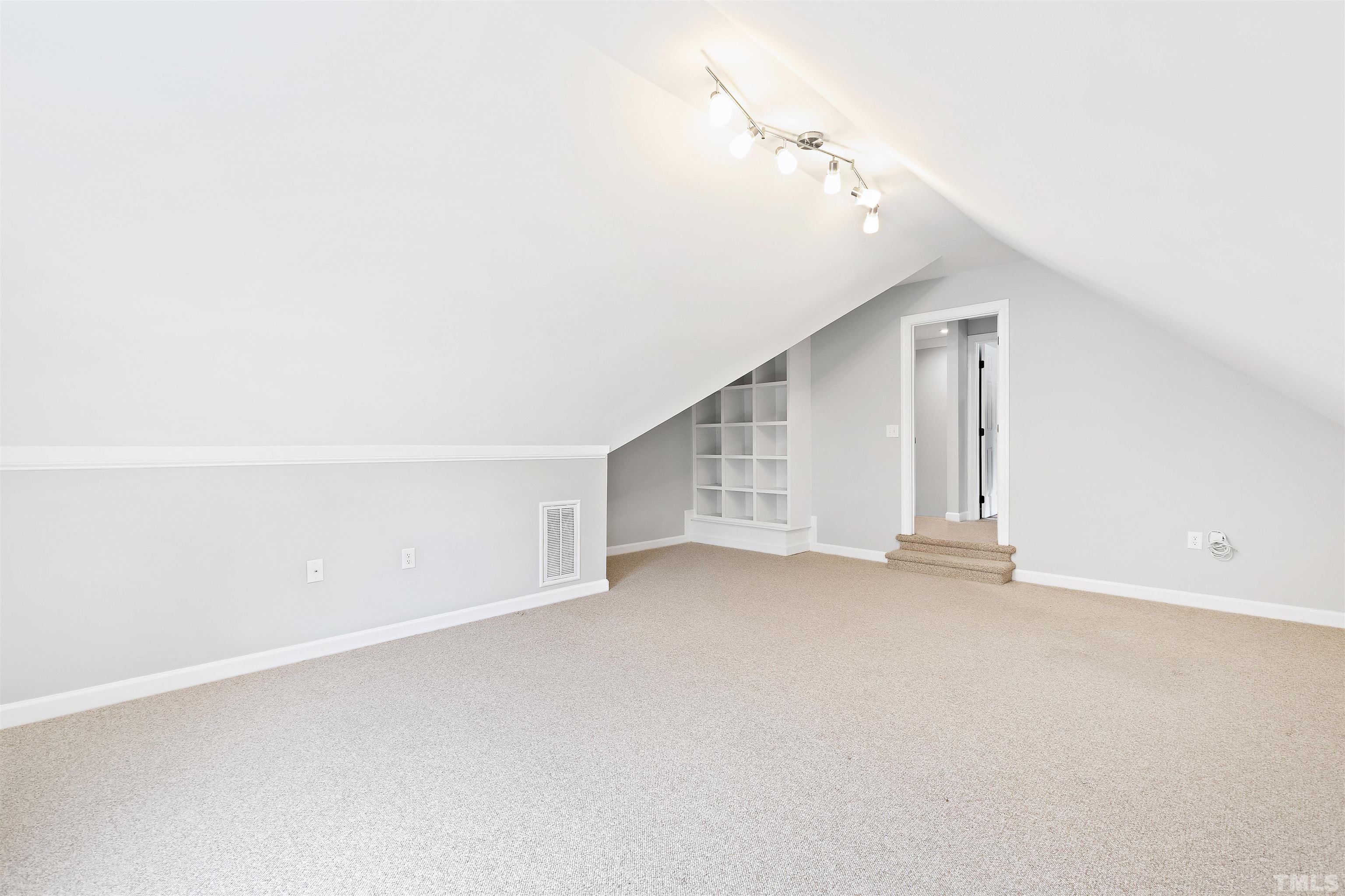 1912 Amity Hill Court Raleigh, NC 27612 - Photo 25 of 36 a view of an empty room with a window