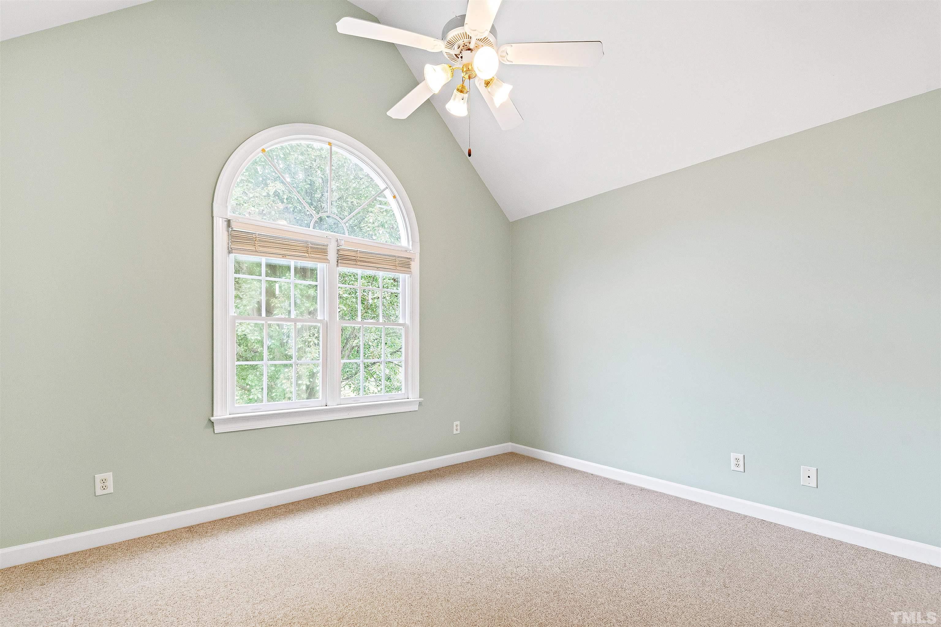 1912 Amity Hill Court Raleigh, NC 27612 - Photo 26 of 36 an empty room with a window and a fan
