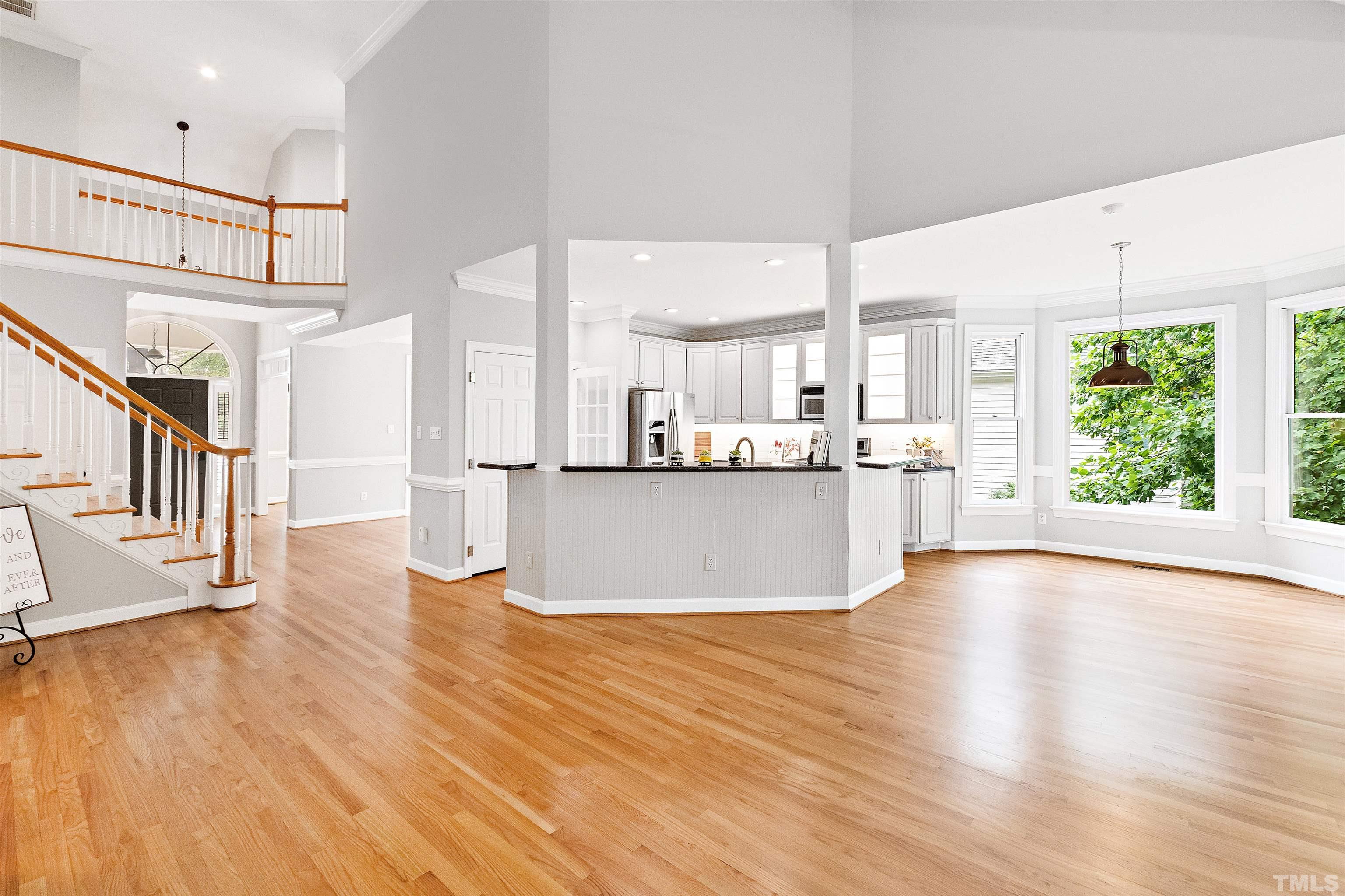 1912 Amity Hill Court Raleigh, NC 27612 - Photo 36 of 36 a view of a kitchen with furniture and wooden floor