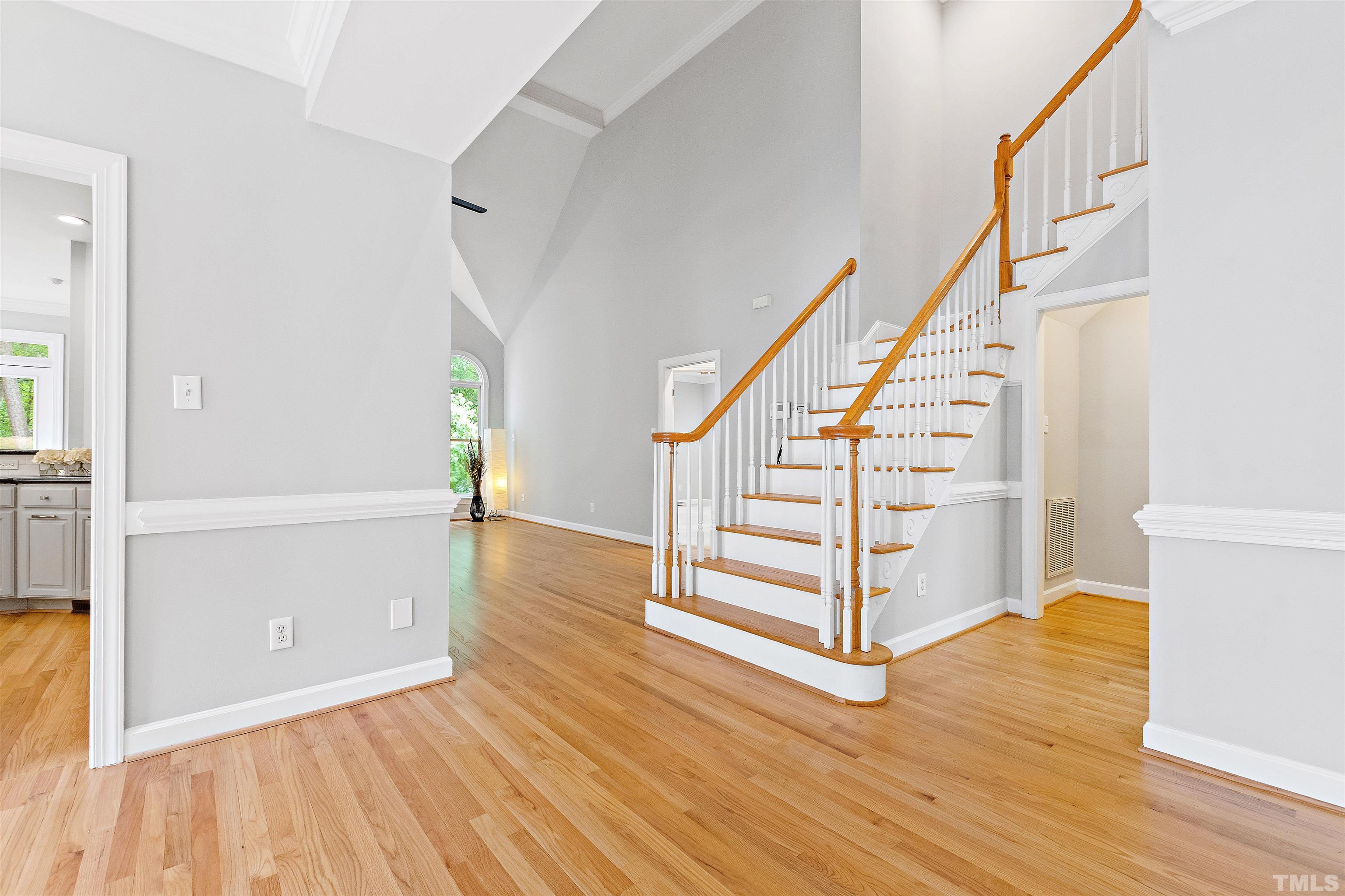 1912 Amity Hill Court Raleigh, NC 27612 - Photo 6 of 36 a view of entryway and hall with wooden floor