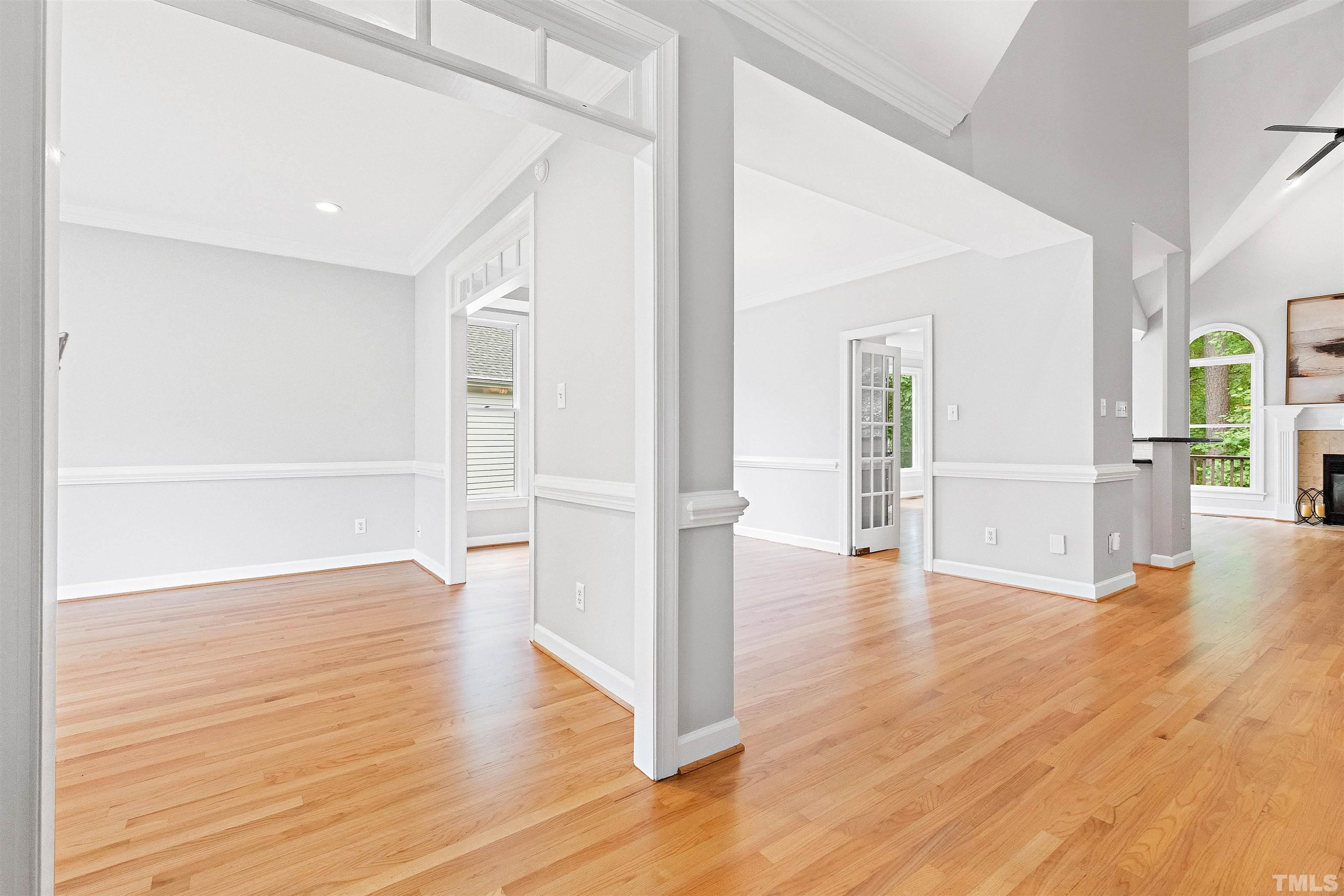 1912 Amity Hill Court Raleigh, NC 27612 - Photo 7 of 36 a view of empty room with wooden floor