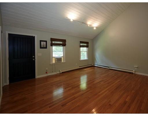 37 Stony Hollow Road Tiverton, RI 02878 - Photo 16 of 30 an empty room with wooden floor and windows